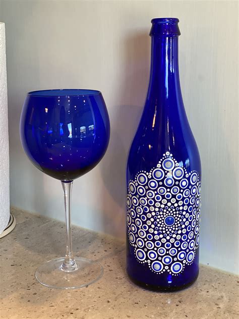 Dot Art On A Blue Wine Bottle In 2021 Painted Wine Bottles Blue Wine