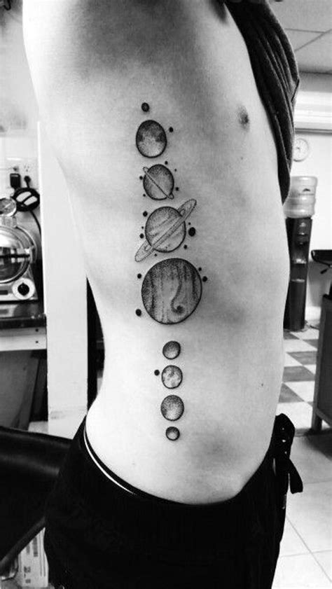 Simple Little Black And White Planet Parade Tattoo On Side