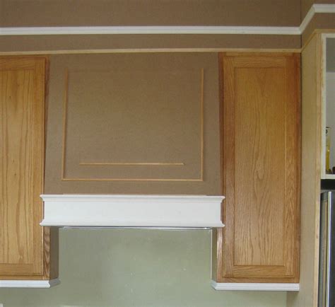 adding moldings   kitchen cabinets remodelando la casa