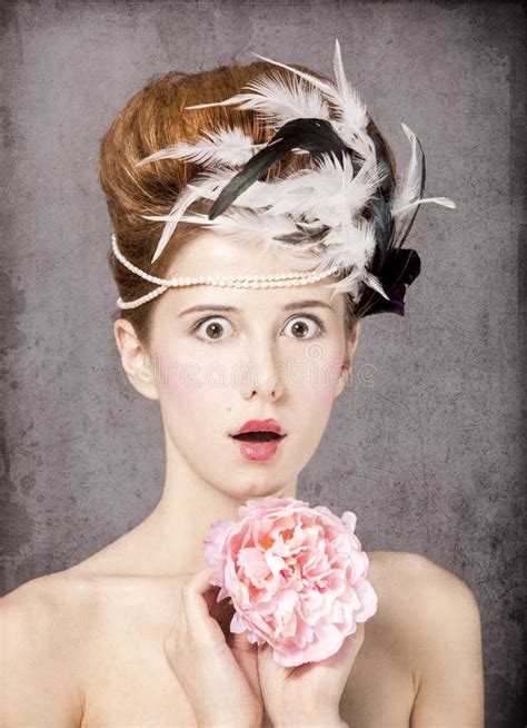 Surprised Redhead Girl With Rococo Hair Style Stock Image