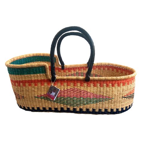 coloured diamond pattern hand woven moses basket  ghana