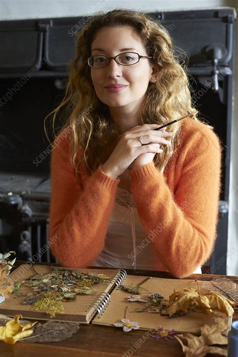 Woman Decorating Dried Herbs And Flowers Stock Image