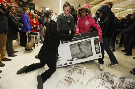 black friday fights  shoppers scramble  holiday deals  stores    uk video