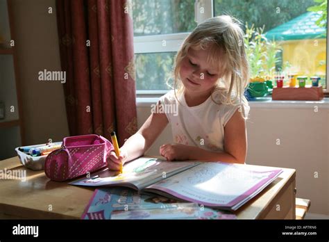 young girl  colouring book stock photo alamy