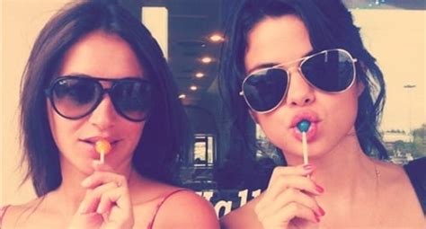 Selena Gomez Suggestively Sucking On A Lollipop