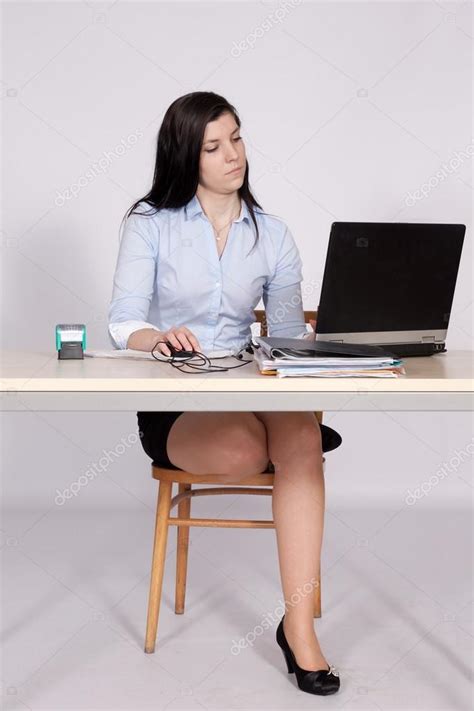 Upskirt Sitting Behind Desk – Telegraph
