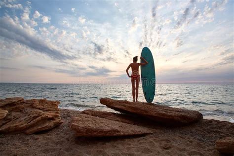 Girl In Bikini With Surfboard Watching Ocean View Summer Vacation