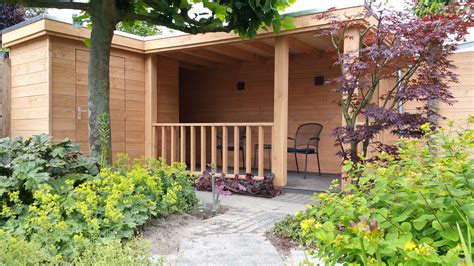 douglas tuinhuis met overkapping garage doors patio outdoor decor plants home decor