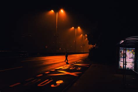 wallpaper orange urban lights silhouette road lamp rain mist walking street light