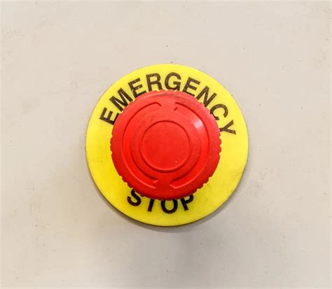 emergency stop button  man stock photo  jocky