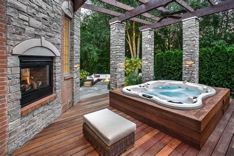 A Fireplace And A Spa Bathtub Is A Perfect Combination For A Cozy Patio