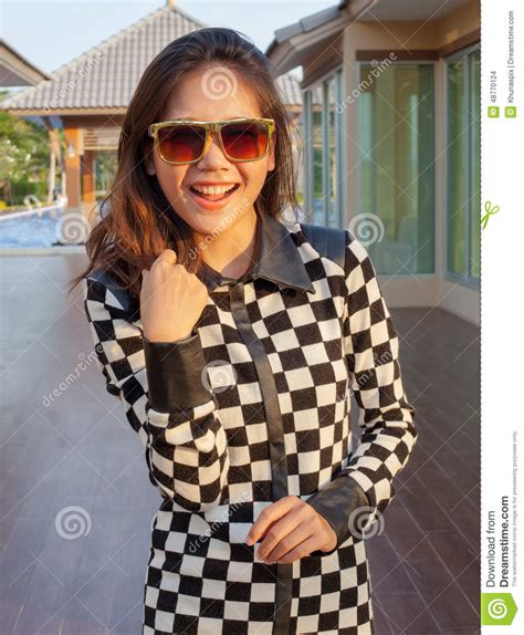 portrait of beautiful teen girl wearing sun glasses with