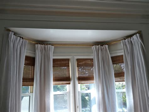 hinged curtain rod  bay window home design ideas