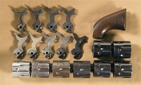colt single action revolver parts including cylinders hammers  rock island auction