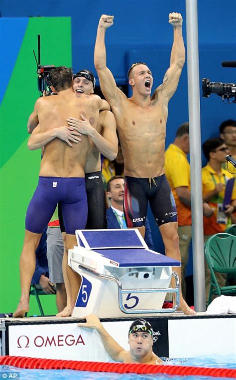 swimmer ryan held breaks down in tears after winning gold