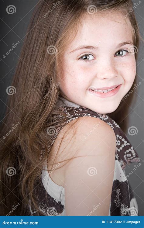 cute brown haired child smiling stock photo image  shine shoulder