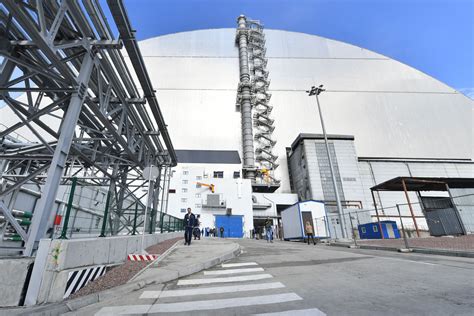 chernobyl reactor encased  giant metal dome     century