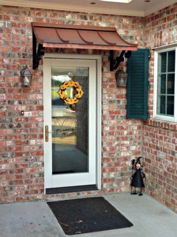 copper concave awning   double  scrolls  tuscumbia al door awnings copper