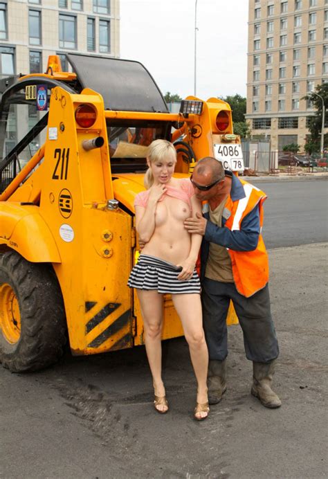 shameless blonde gives touch her tits to worker at public square russian sexy girls