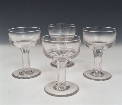 antique set of four champagne glasses