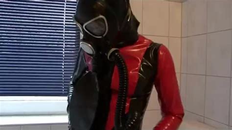 heavy latex rubber slave girl with pisspants gasmask and