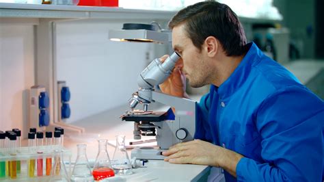 male scientist  microscope research man scientist