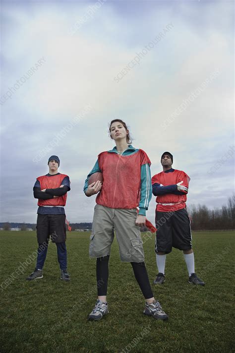 Mixed Race Members Of A Team Of American Football Stock