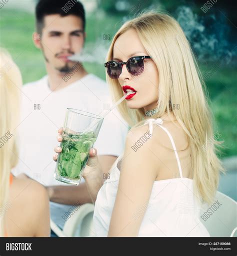 woman drink mojito image and photo free trial bigstock