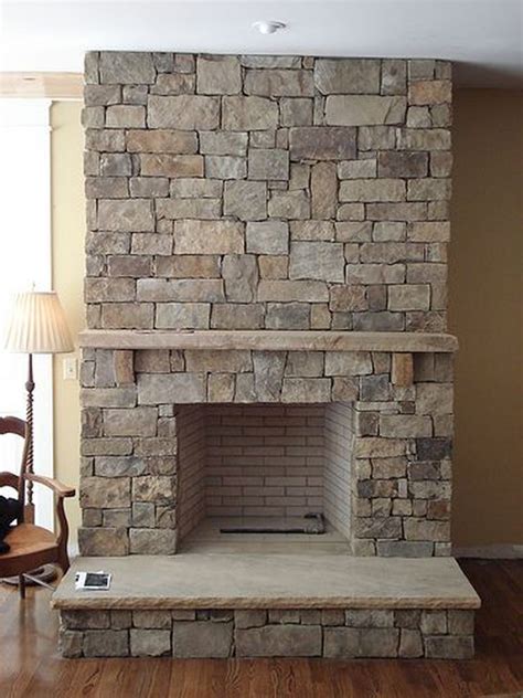 stone fireplace designs   rustic style living room talkdecor