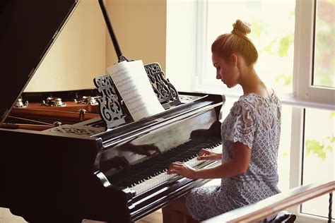 Woman On The Piano The French Compass