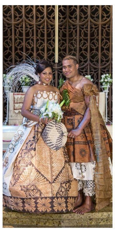 lovely fijian couple wearing tapacloth on their wedding