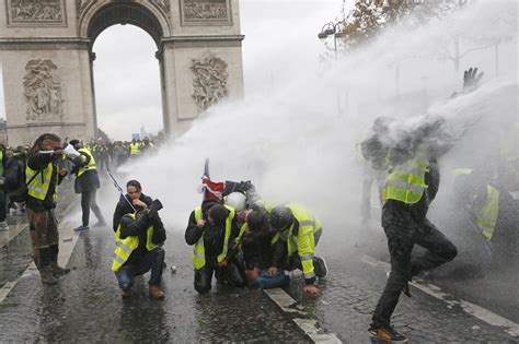 french police clash  protesters  paris riot  injured cbs news