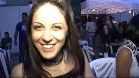 pretty latina cocksucking at a public party smiles