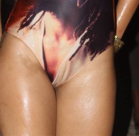 rihanna shows vagina and tits and ass in a hot one piece swimsuit