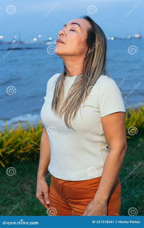 Portrait Of Mature Latina Woman Pensive In Park Stock Image Image Of