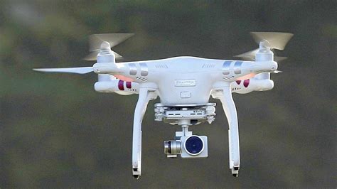 spy   sky drone stalks terrified family  courier mail