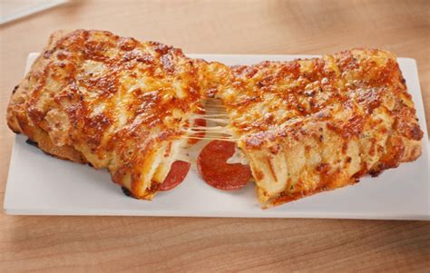 dominos debuts pepperoni stuffed cheesy bread   outlets econotimes