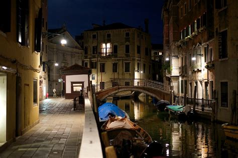 Sweeping The Stones Venice Canal At Night Italy