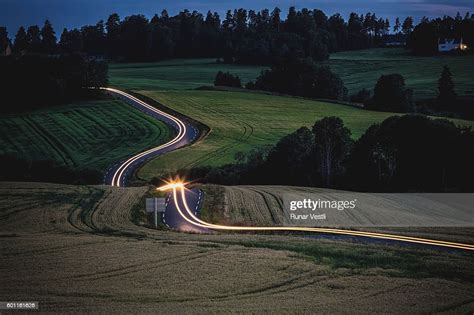 long exposure  car driving   curvy road   countryside high