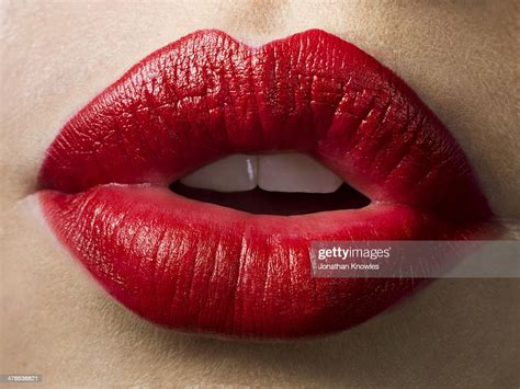 Female Lips With Red Lipstick On Close Up Photo Getty Images