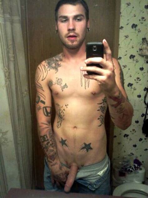 tattooed fella shows his thin penis nude men selfies