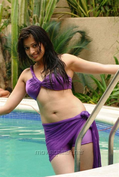 hot picture world lakshmi rai boobs and navel in purple swim dress