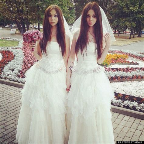 androgyne russian groom dmitry kozhukhov and bride alisa tie the knot in identical white wedding