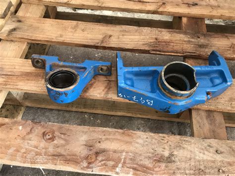 ford  holland    front axle support pivots black dog machinery