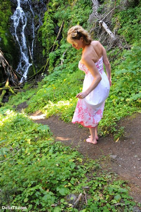 Pretty Delia Erect Under Dress By A Waterfall Photo 5