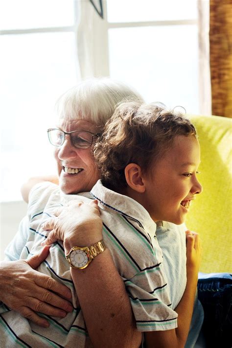 Grandma And Grandson Hugging After Social Distancing Premium Image By