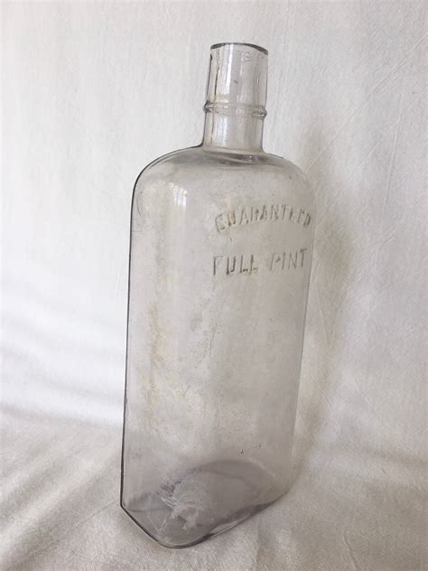 guaranteed full pint antique liquor bottle   collectible etsy
