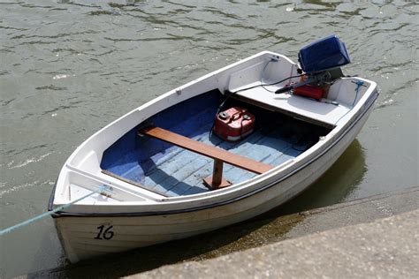 small dinghy boat   tidal sea river  photo  freeimages