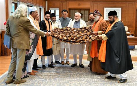 pm modi hands over chadar to delegation which will be