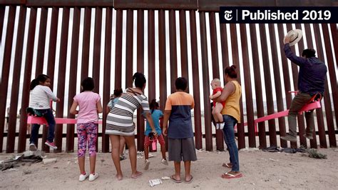 seesaws straddle the mexico border and smiles shine through the new